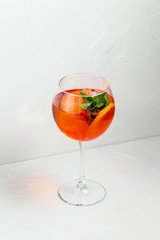 Sweet appetizing aperol spritz fruit cocktail 
