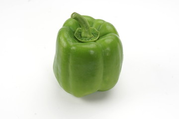 Fresh, green paprika isolated on a white background.