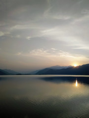 Fototapeta na wymiar sunset at a water reservoir.