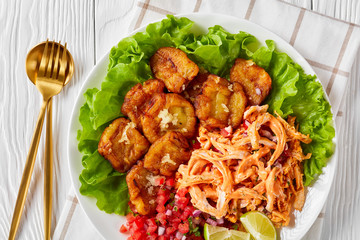 Fried plantains tossed with garlic with chicken