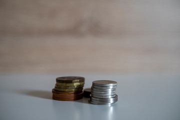 stack of coins on a white background