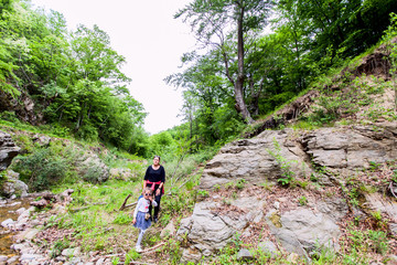 Obraz premium Family Enjoy Nature, Hiking, People, Stream,Spring