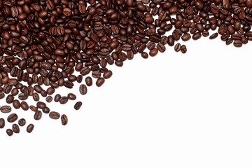 coffee background of brown beans, the beans are arranged diagonally, lying on the surface on an empty white background. coffee abstraction with an empty space