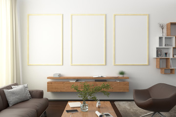 Three vertical blank poster on white wall in interior of modern living room with clipping path around poster. 3d illustration