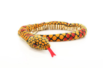 plush toy snake long realistic toy tongue orange yellow white background