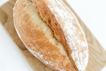 Homemade freshly baked bread.White bread.Healthy food.White background.Close-up view