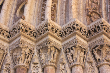 Fototapeta premium Detail of the Puerta de la Almoina in the Romanesque-style Cathedral of Santa María in Valencia