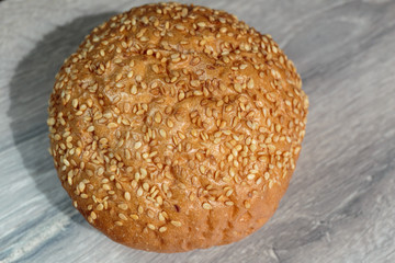 Hamburger bun with sesame seeds.