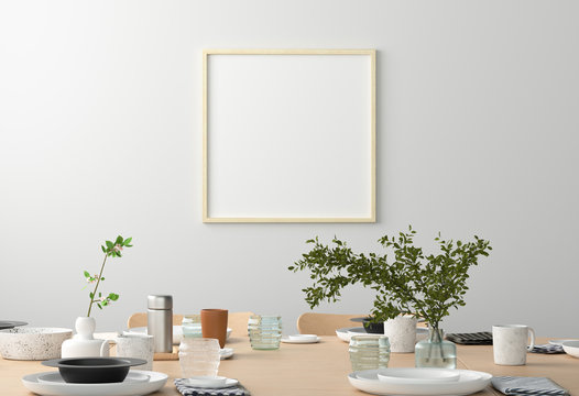 Square blank poster on white wall in interior of modern dining room. Clipping path around poster. 3d illustration