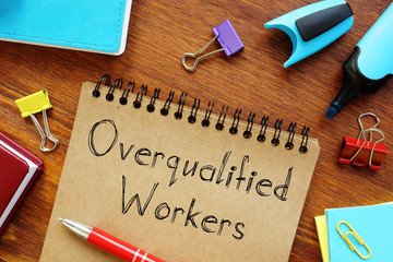 Overqualified Workers are shown on the conceptual business photo