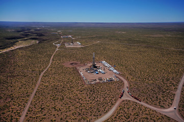 image of hydraulic fracturing unit with blue sky