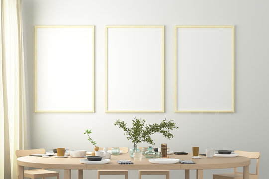 Three vertical blank posters on white wall in interior of modern dining room. Clipping path around poster. 3d illustration