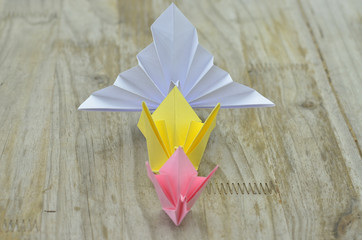 Croaking origami peacocks
