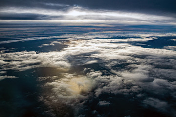 Clouds over the sea or ocean and sun reflection in water. Aerial view of the Irish Sea