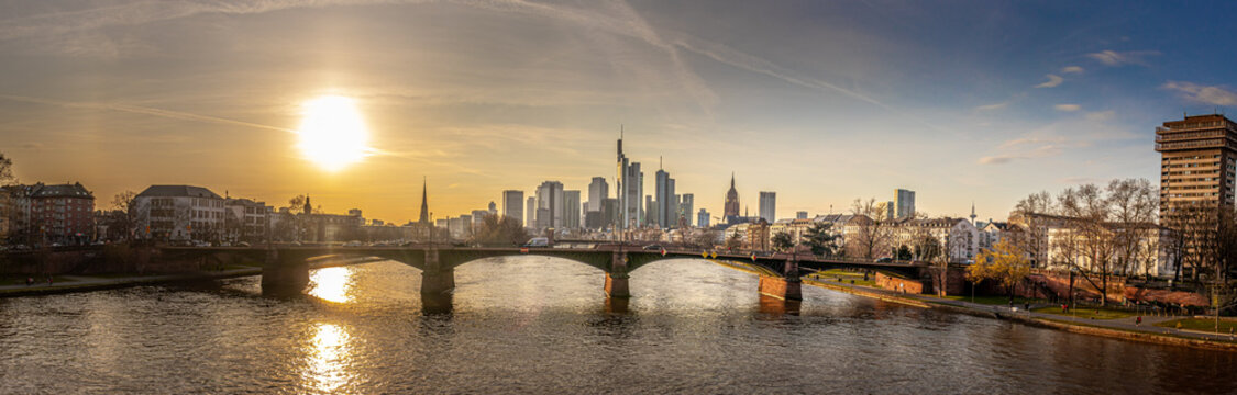 setting sun in the early spring over the frankfurt skyline