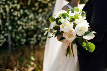 Bride hold the bouquet, closeup