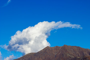 Naklejka na ściany i meble Sky and clouds with ibex form