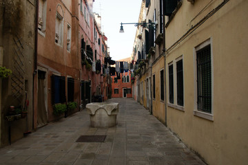 Fototapeta na wymiar Photo of the street in Venice with loundry on the rope. Castello district.