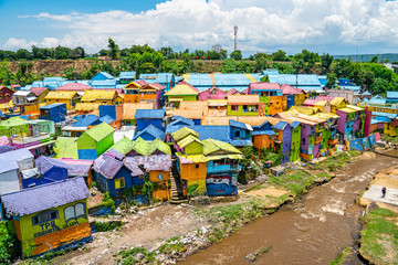Fototapeta premium the colourful rainbow village also know as Kampung Warna Warni. amazing colours everywhere where the locals live in Malang, Java, Indonesia