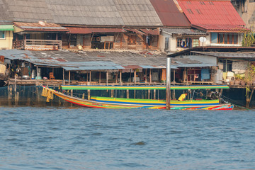 Fototapeta na wymiar .03/02/2020 Bangkok, Thailand. The long tail boat in Chao Phraya river carries passengers between the banks of the river. Long tail boat is a very popular and affordable transport among locals.