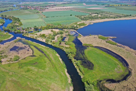 View from above on the landscape of the river Havel. In this aerial view you can see the water.