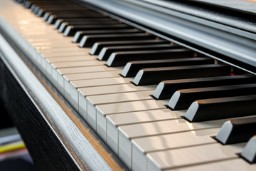 Close up black and white piano keys.