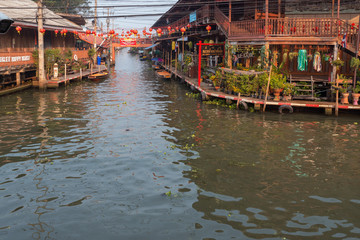 02.02.2020 Thailand, Ratchaburi, famous Damnoen Saduak floating market in Ratchaburi. Local peoples sell fruits, food and souvenirs. very popular place among tourists from all over the world