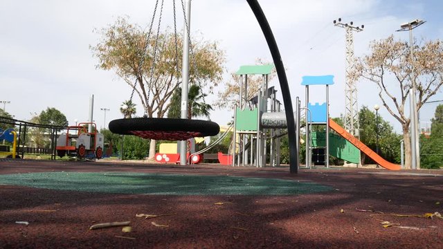 complex playground covered with synthetic carpet with gaming devices for active physical development