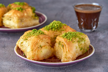 Sweets arabic dessert kunefe, kunafa, knafeh with pistachio and cheese