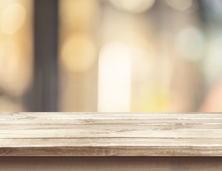Wooden table top on blur background