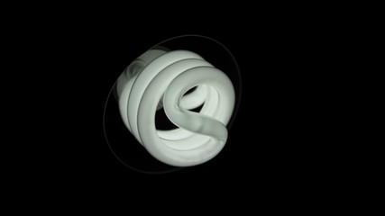 Light bulb fluorescent on black background