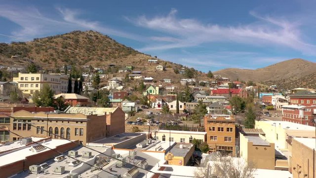 Flying Low Over The Old And Historical Buildings In Bisbee, Arizona, USA On A Sunny Day. - aerial drone shot