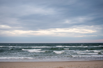 Empty Rockaway Beach at sunset in Queens, New York City in May 2020