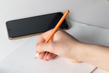 paint brush paints on paper