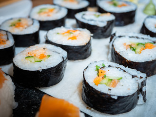 sushi on a plate/chopping board close up 