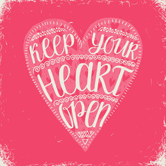 Keep your heart open. Hand lettering Valentines day phrase on a pink background.