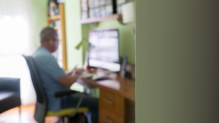 Caucasian male work at home in workplace unfocused