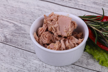 Tasty canned tuna fish in the bowl