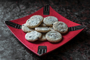 crackers served on a red plate