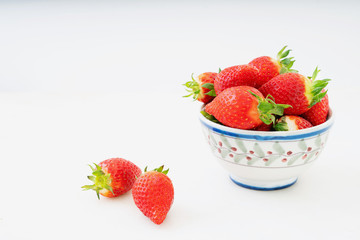 Fresh juicy strawberries in the bowl