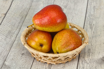 Pear heap in the wooden basket
