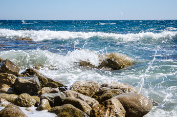 Seascape storm on wild rocky seashore