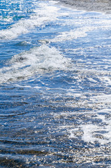 Fototapeta premium Seascape background white waves on coast