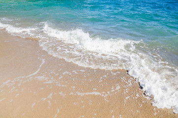 Fototapeta na wymiar Tropical seascape background white sandy beach and turquoise water
