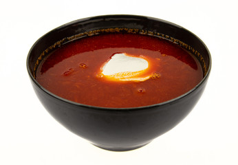 Red borscht plate on white background. Traditional Ukrainian Russian borscht
