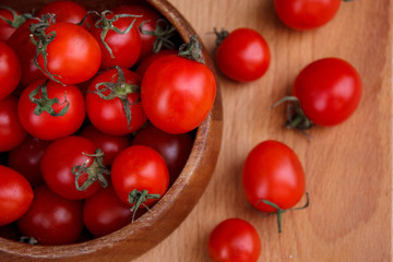 tomatoes on a wooden board