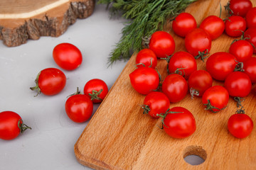 cherry tomatoes in a wooden bowl