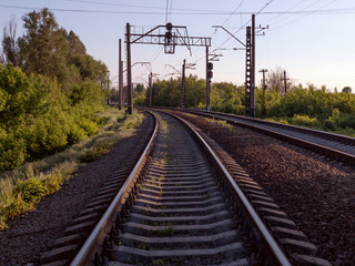 Fototapeta na wymiar Railroad and sky. Railroad tracks in nature. Long rails