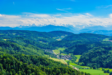 Panoramic view of Zurich lake and Alps from the top of Uetliberg mountain, from the observation platform on tower on Mt. Uetliberg, Switzerland, Europe