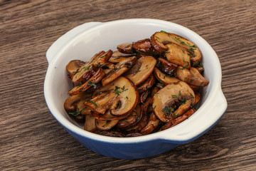 Roasted champignon with herbs and spices